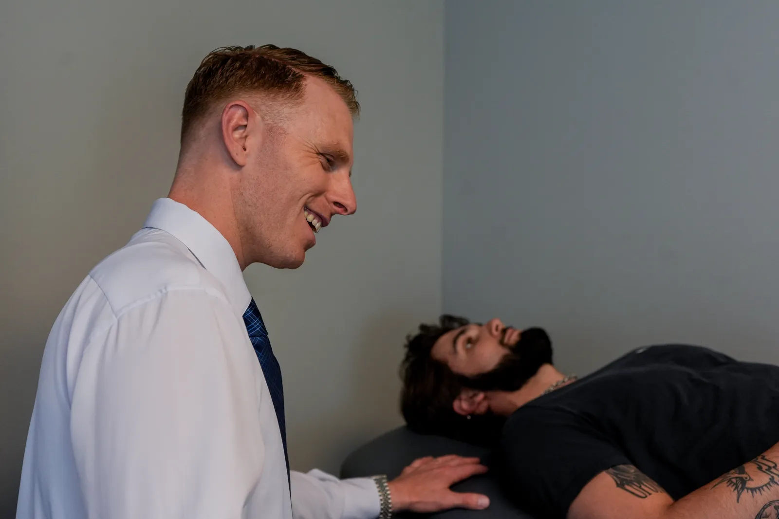 Dr. Ryan Bielecki providing one-on-one chiropractic care at SpineCo in Downers Grove, IL